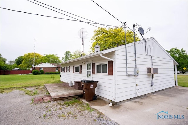 1618 S Clinton St, Defiance, OH 43512 - view of side of property featuring a yard, a chimney, and a wooden deck