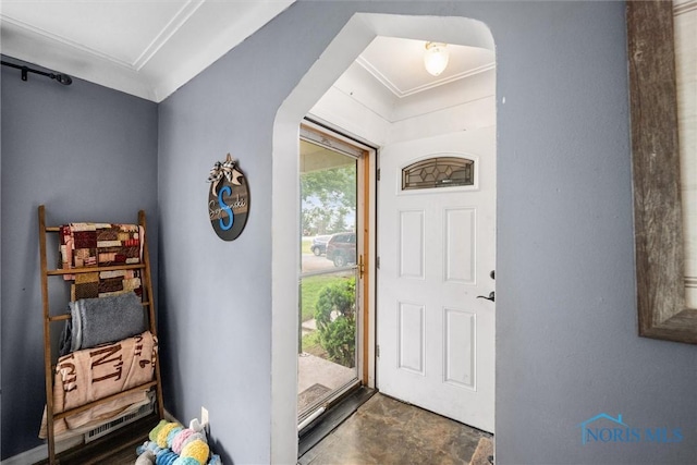 19330 N Dixie Hwy, Bowling Green, OH 43402 - foyer entrance featuring arched walkways, crown molding, and dark stone finish flooring