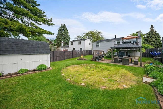 5453 Brook Point Rd, Toledo, OH 43611 - view of yard with an outdoor living space with a fire pit, a patio, and a gazebo