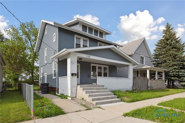 148 W Foulkes St, Toledo, OH 43605 - american foursquare style home with covered porch and brick siding
