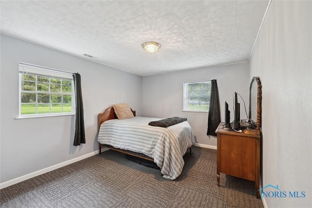 3480 Circle Dr, Delta, OH 43515 - bedroom featuring baseboards and carpet floors