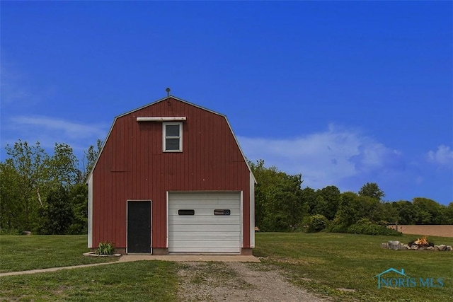 22227 US Highway 20a, West Unity, OH 43570 - view of barn featuring driveway and a yard