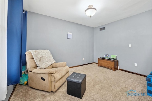 219 Illinois Dr, Bryan, OH 43506 - living area with carpet floors and baseboards
