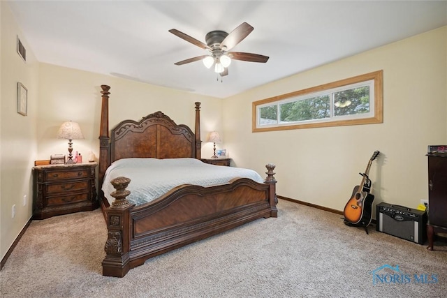 219 Illinois Dr, Bryan, OH 43506 - bedroom featuring carpet flooring, baseboards, and a ceiling fan