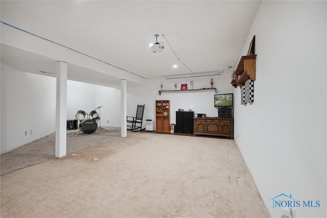 219 Illinois Dr, Bryan, OH 43506 - finished below grade area featuring carpet flooring
