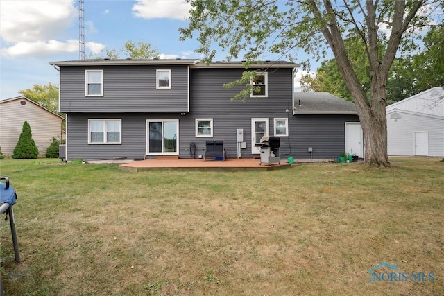 219 Illinois Dr, Bryan, OH 43506 - back of property featuring a yard