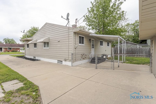 1048 Richland St, Maumee, OH 43537 - back of house featuring a gate and a patio