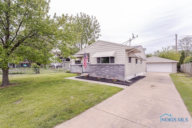 1048 Richland St, Maumee, OH 43537 - bungalow featuring an outdoor structure, brick siding, and a garage