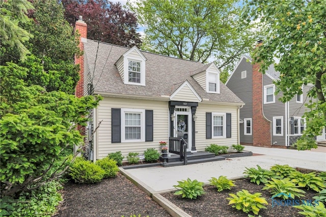 502 River Rd, Maumee, OH 43537 - new england style home featuring roof with shingles and a chimney