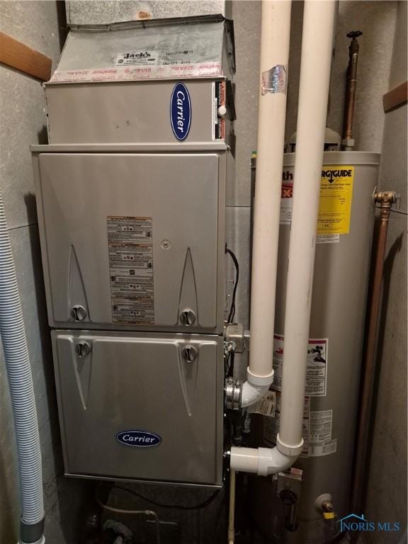 1100 Cherry Ln, Findlay, OH 45840 - utility room with water heater