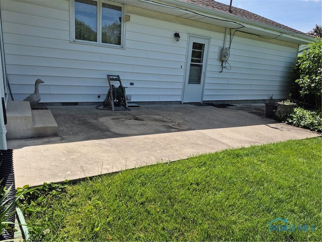 1100 Cherry Ln, Findlay, OH 45840 - back of house with a patio, a yard, and roof with shingles