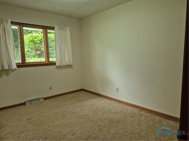 1100 Cherry Ln, Findlay, OH 45840 - empty room with carpet and baseboards