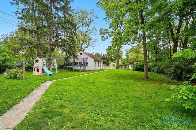 314 E 2nd St, Perrysburg, OH 43551 - view of grassy yard with a playground