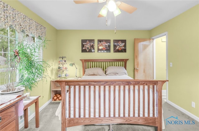 2742 Sandalwood Ave, Toledo, OH 43614 - bedroom featuring carpet, baseboards, and a ceiling fan