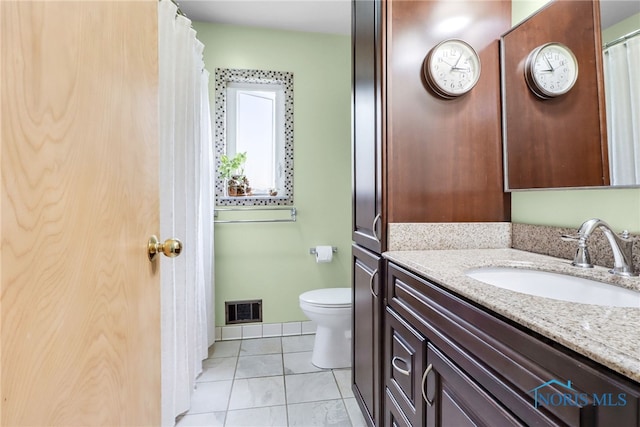 2742 Sandalwood Ave, Toledo, OH 43614 - full bath with vanity, toilet, and tile patterned flooring