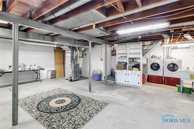 2742 Sandalwood Ave, Toledo, OH 43614 - unfinished basement featuring independent washer and dryer, heating unit, and stairway