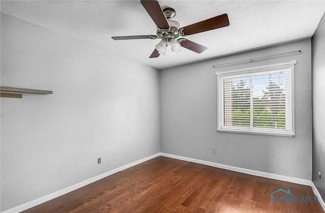 6640 Salisbury Rd Unit 212, Maumee, OH 43537 - spare room with wood finished floors, a ceiling fan, and a textured ceiling