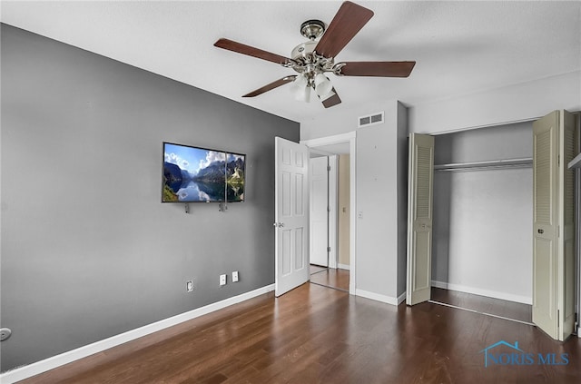 6640 Salisbury Rd Unit 212, Maumee, OH 43537 - unfurnished bedroom with wood finished floors, a closet, and ceiling fan