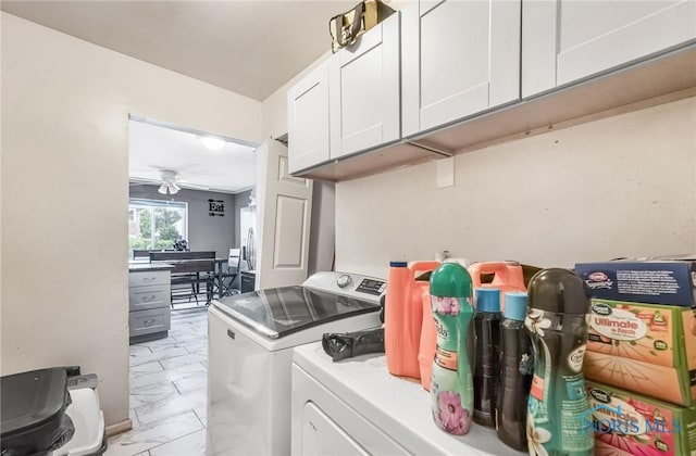2146 Alvin St, Toledo, OH 43607 - laundry area featuring light marble finish floors, separate washer and dryer, cabinet space, and ceiling fan