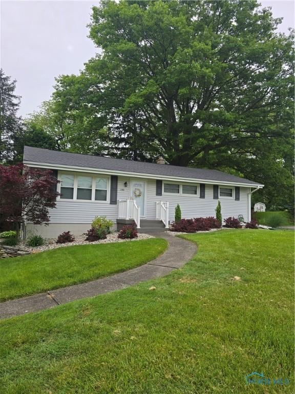 1501 Tiffin Rd, Fremont, OH 43420 - ranch-style house with a front lawn