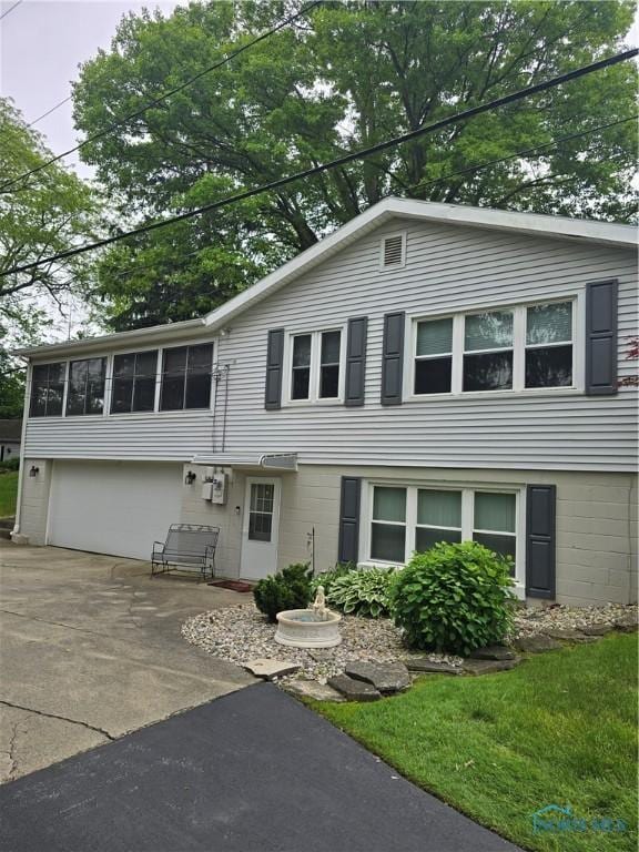 1501 Tiffin Rd, Fremont, OH 43420 - view of front of house with driveway and an attached garage