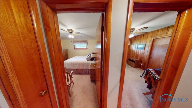1501 Tiffin Rd, Fremont, OH 43420 - corridor featuring carpet and wooden walls