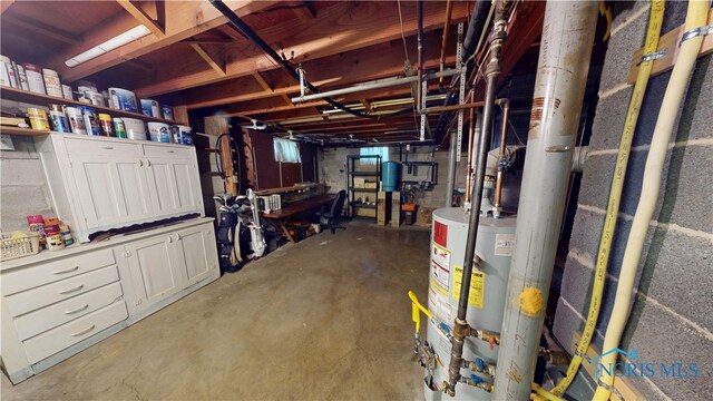 1501 Tiffin Rd, Fremont, OH 43420 - unfinished basement with gas water heater