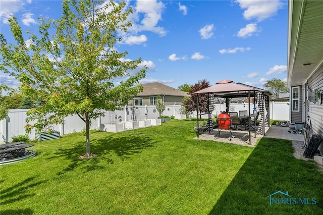 1240 Ithica Ct, Findlay, OH 45840 - view of yard featuring a gazebo and a patio