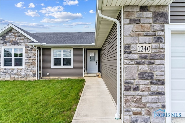 1240 Ithica Ct, Findlay, OH 45840 - doorway to property featuring stone siding, a lawn, and a shingled roof
