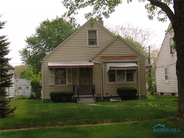 642 Brookley Blvd, Toledo, OH 43607 - bungalow-style home with a chimney