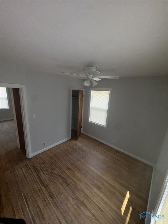 642 Brookley Blvd, Toledo, OH 43607 - spare room with healthy amount of natural light, wood finished floors, baseboards, and ceiling fan