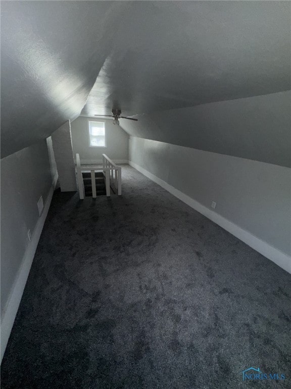 642 Brookley Blvd, Toledo, OH 43607 - bonus room featuring lofted ceiling, carpet floors, a ceiling fan, and baseboards