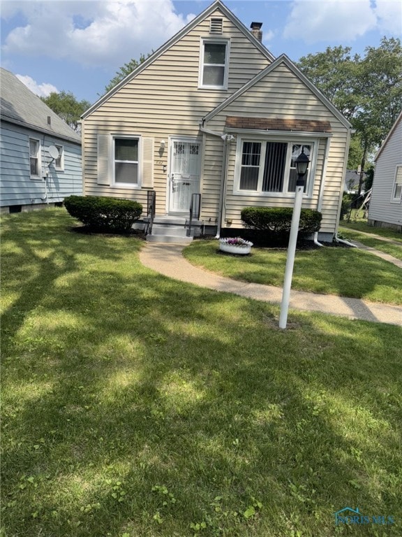642 Brookley Blvd, Toledo, OH 43607 - view of front of house featuring a front lawn