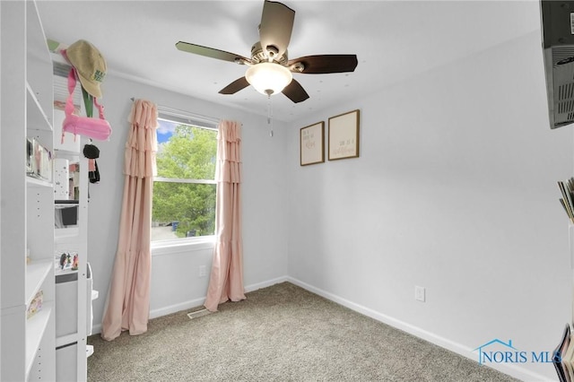 4238 Knollcrest Rd, Toledo, OH 43611 - unfurnished bedroom featuring carpet, baseboards, and ceiling fan
