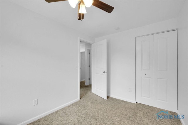 4238 Knollcrest Rd, Toledo, OH 43611 - unfurnished bedroom with carpet floors, baseboards, a closet, and a ceiling fan