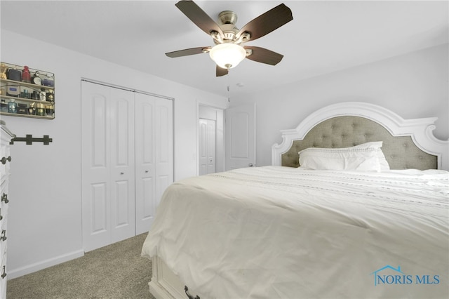 4238 Knollcrest Rd, Toledo, OH 43611 - bedroom with light colored carpet, a closet, baseboards, and ceiling fan