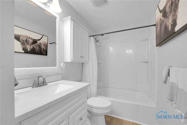 4238 Knollcrest Rd, Toledo, OH 43611 - full bathroom with vanity, shower / tub combo, toilet, and tile patterned floors