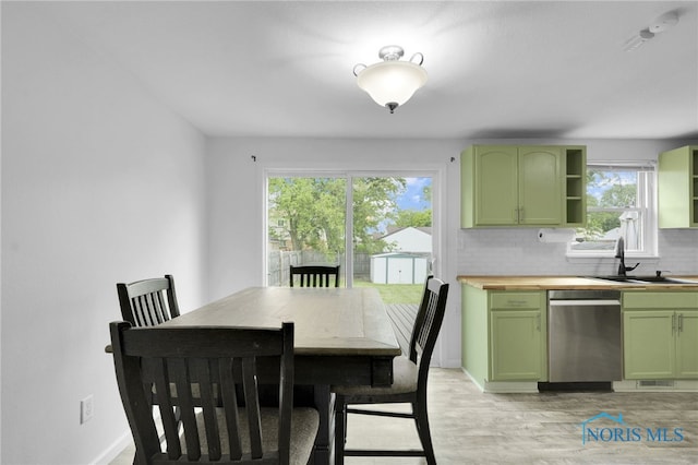 4238 Knollcrest Rd, Toledo, OH 43611 - dining space featuring plenty of natural light, light wood-style flooring, and baseboards