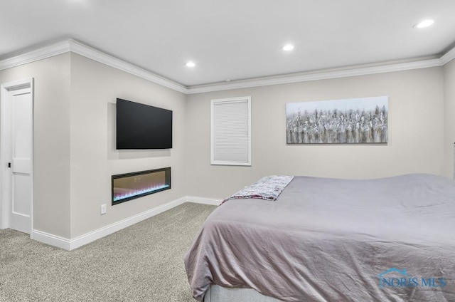 2714 W Rockridge Cir, Toledo, OH 43606 - bedroom featuring carpet floors, crown molding, baseboards, a glass covered fireplace, and recessed lighting