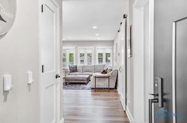 2714 W Rockridge Cir, Toledo, OH 43606 - corridor with wood finished floors and recessed lighting
