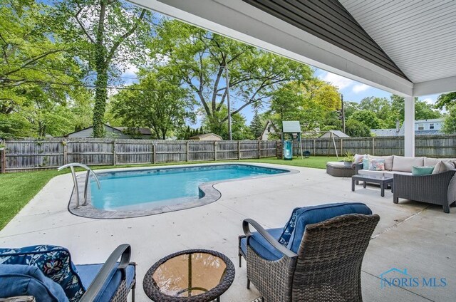 2714 W Rockridge Cir, Toledo, OH 43606 - view of pool with an outdoor hangout area, a patio, and a playground