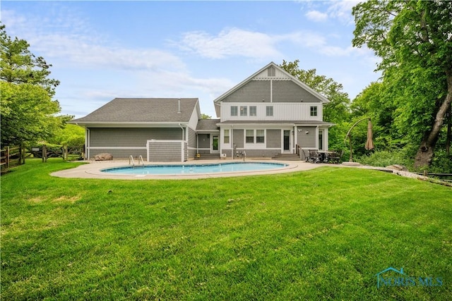 1860 Watermill Ln, Perrysburg, OH 43551 - back of property with a patio, an outdoor pool, and entry steps