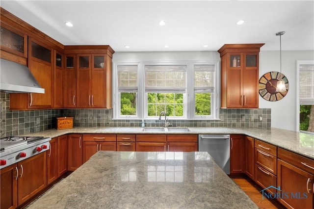 1860 Watermill Ln, Perrysburg, OH 43551 - kitchen featuring stainless steel appliances, exhaust hood, a sink, light stone countertops, and hanging light fixtures