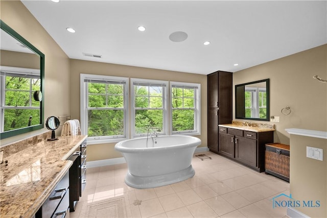 1860 Watermill Ln, Perrysburg, OH 43551 - full bathroom featuring plenty of natural light, vanity, a soaking tub, baseboards, and recessed lighting