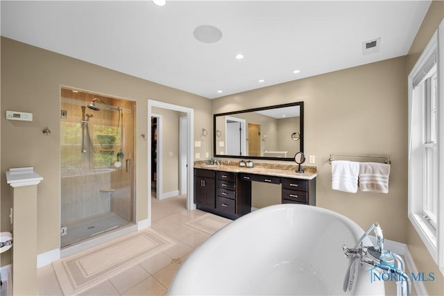 1860 Watermill Ln, Perrysburg, OH 43551 - bathroom with a freestanding bath, vanity, a stall shower, tile patterned flooring, and recessed lighting