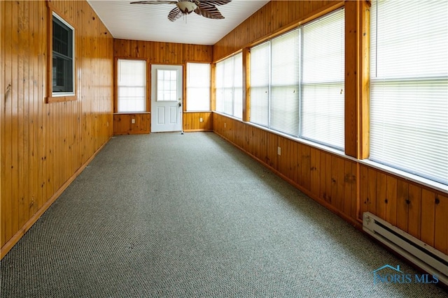 555 Race St, Clyde, OH 43410 - unfurnished sunroom featuring a baseboard radiator