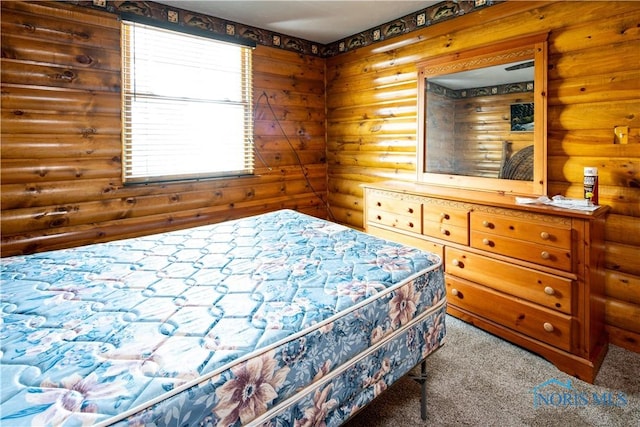 555 Race St, Clyde, OH 43410 - carpeted bedroom featuring log walls