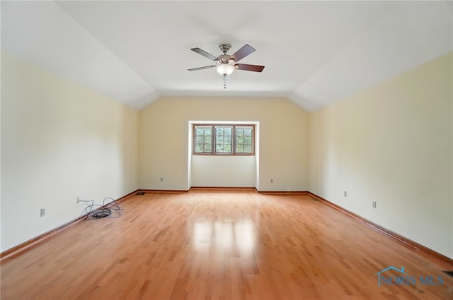 4820 Olde Meadow Ln, Sylvania, OH 43560 - bonus room featuring a ceiling fan, light wood-style flooring, vaulted ceiling, and baseboards