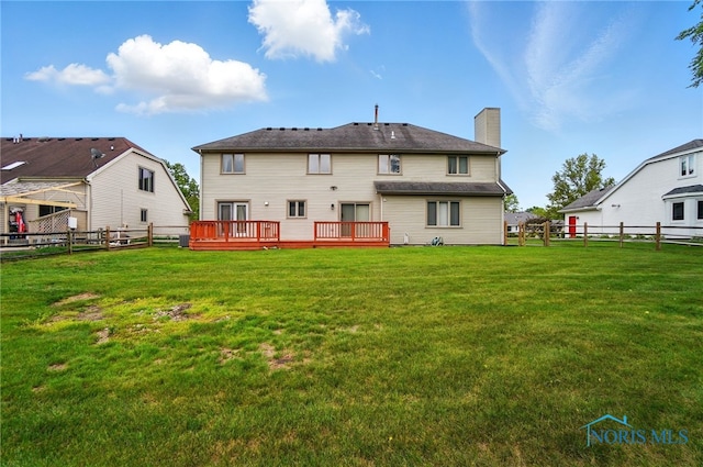 4820 Olde Meadow Ln, Sylvania, OH 43560 - rear view of property with a chimney and a wooden deck