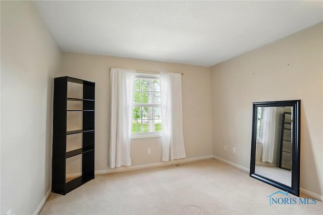 8420 Willow Glen Ct, Holland, OH 43528 - carpeted spare room with baseboards